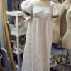 White cotton empire dress with green trim.  This picture was taken prior to altering or hand painting the dress.